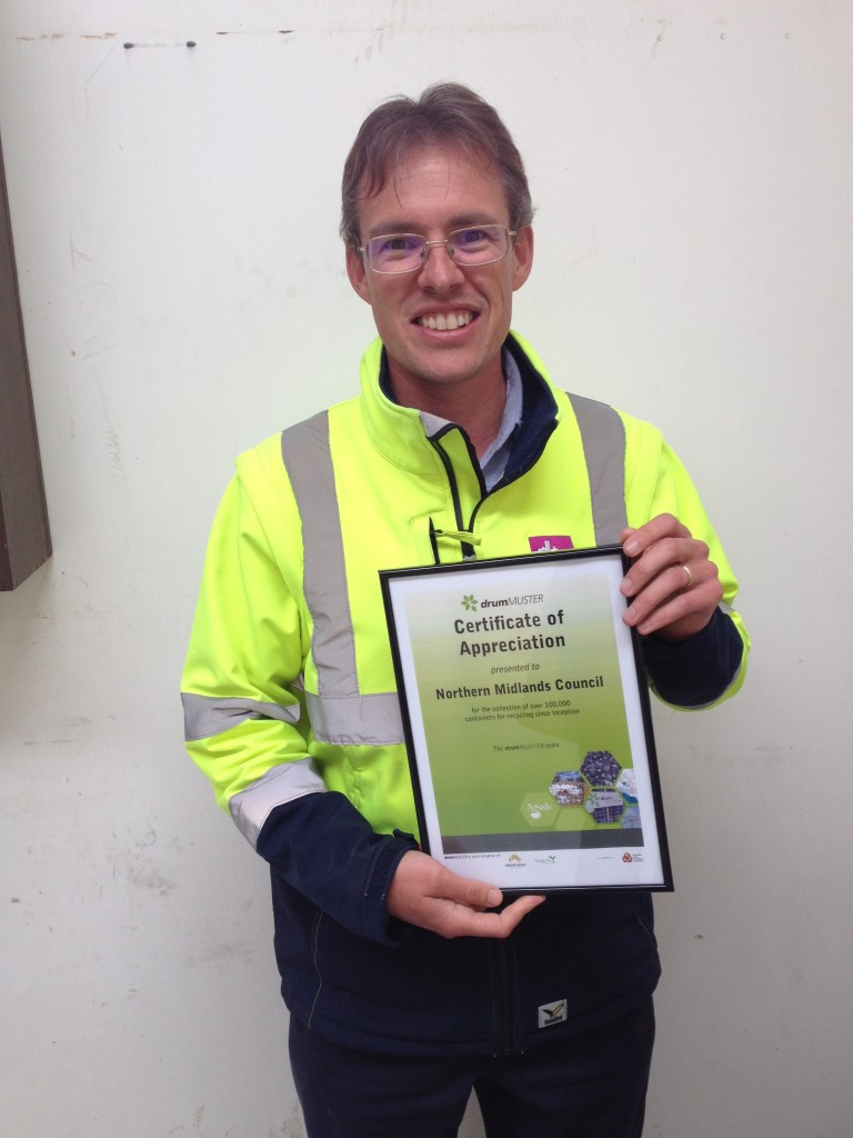 Jonathan Galbraith, Waste Management Officer at the Northern Midlands Council, with a certificate from drumMUSTER.